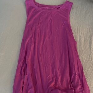 Tavi cute top that ties in back , perfect for work outs or every day wear .